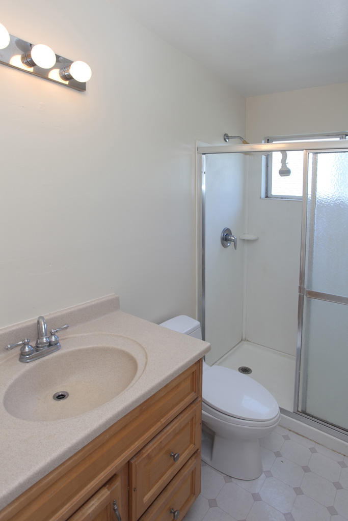 460 Fellowship Road Santa Barbara, CA 93109 - Photo 15 of 21 a bathroom with a sink a toilet and shower