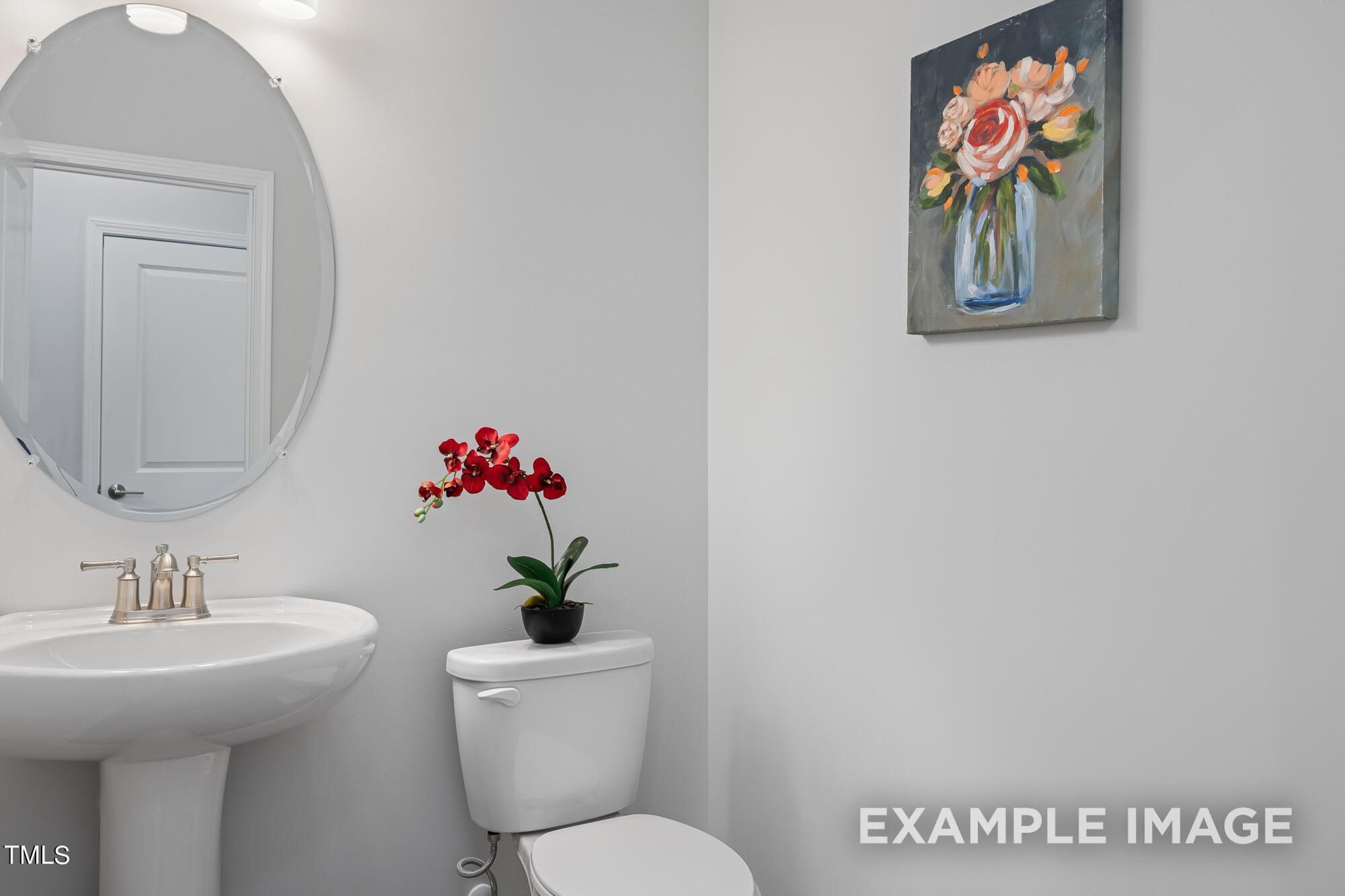 62 Golden Leaf Farms Road Angier, NC 27501 - Photo 23 of 31 a bathroom with a toilet sink and mirror