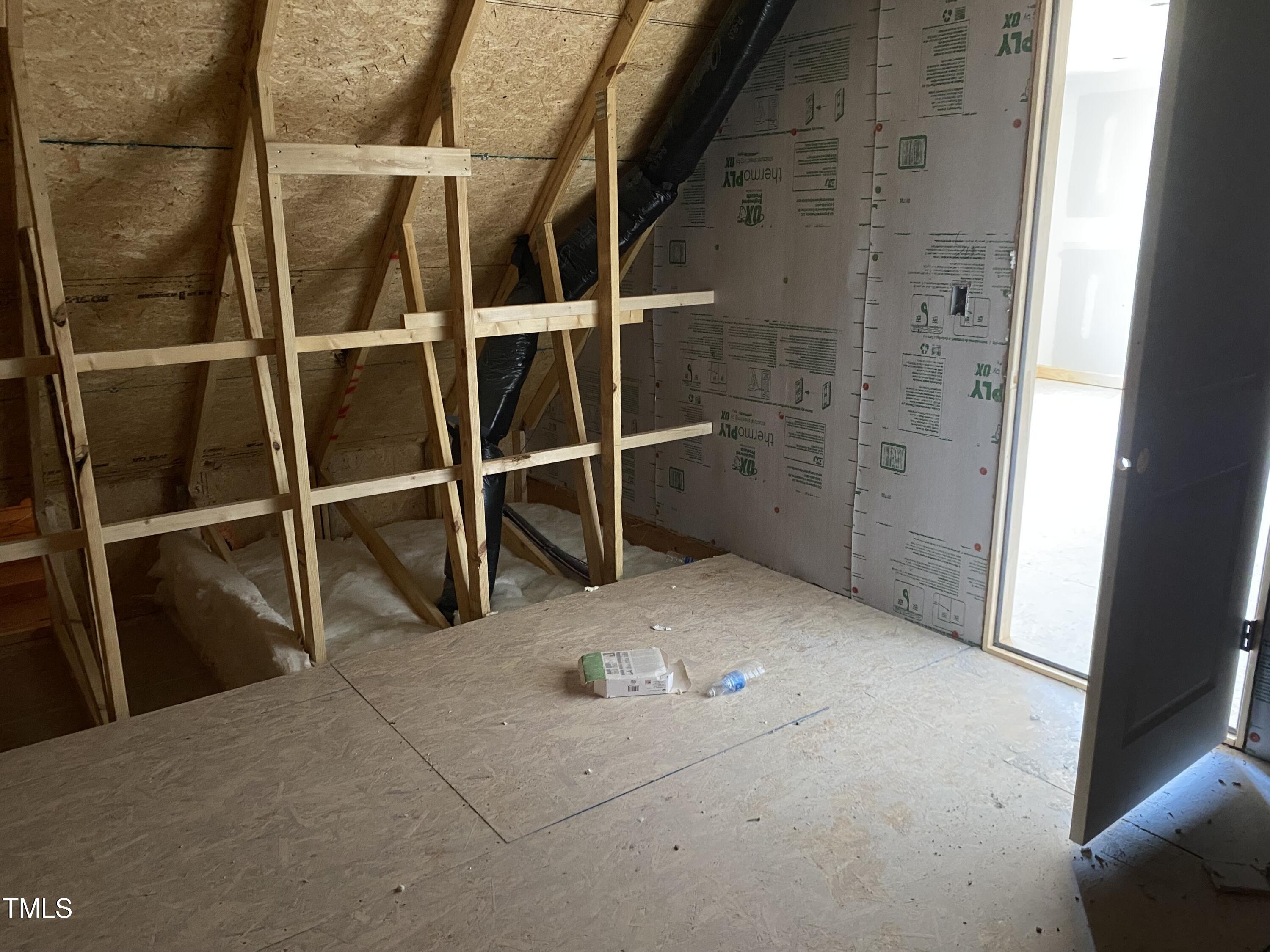 62 Golden Leaf Farms Road Angier, NC 27501 - Photo 8 of 31 a view of an empty room with a door