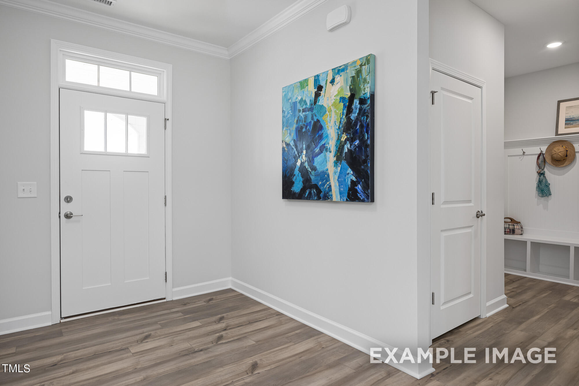 62 Golden Leaf Farms Road Angier, NC 27501 - Photo 10 of 31 an empty room with wooden floor and windows