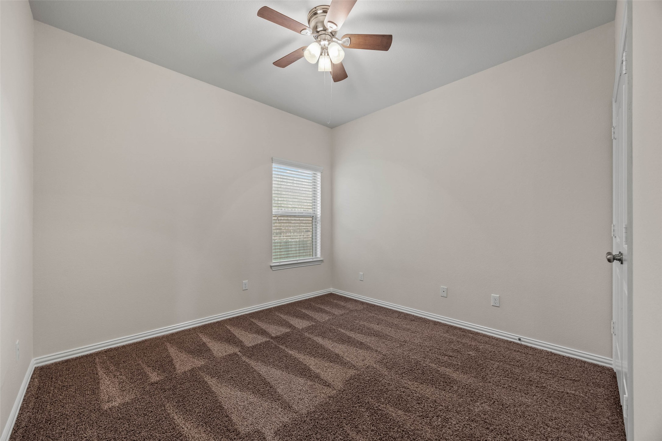 536 Rancho Verde Drive Leander, TX 78641 - Photo 21 of 37 a view of room with window and ceiling fan