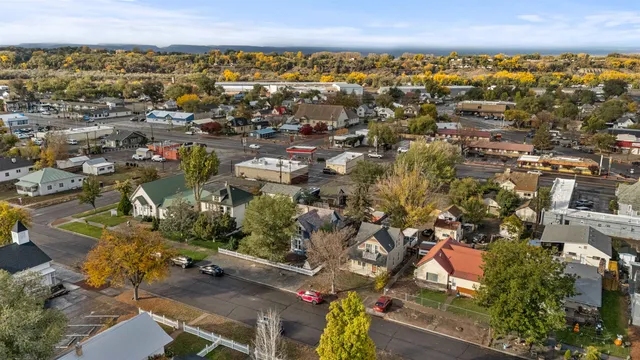 a bathroom with a sink vanity mirror and tub