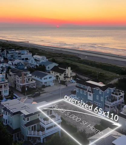 a roof deck with table and chairs and potted plants