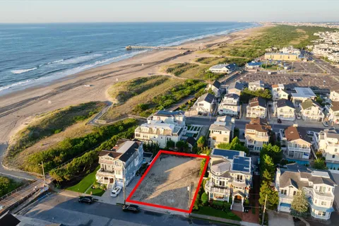 a view of a terrace with wooden floor and outdoor seating