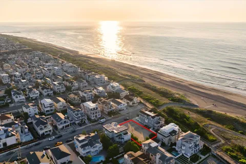 an aerial view of beach and ocean