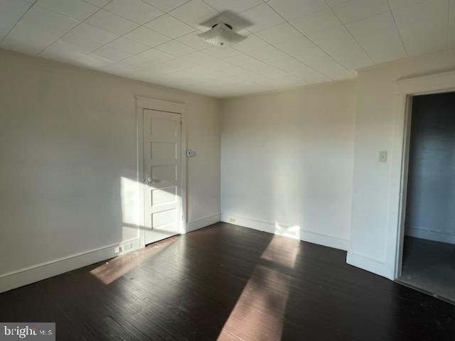 108 South Kenhorst Boulevard Reading, PA 19607 - Photo 11 of 30 an empty room with wooden floor and windows