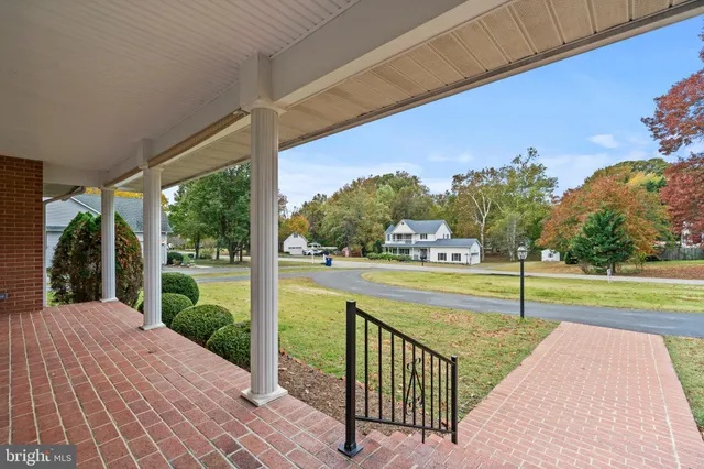 a view of swimming pool with a patio