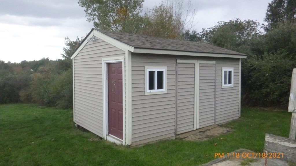 37 Henry Marsh Road Dudley, MA 01571 - Photo 6 of 28 a view of a house with a yard