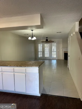 a view of a kitchen with a sink