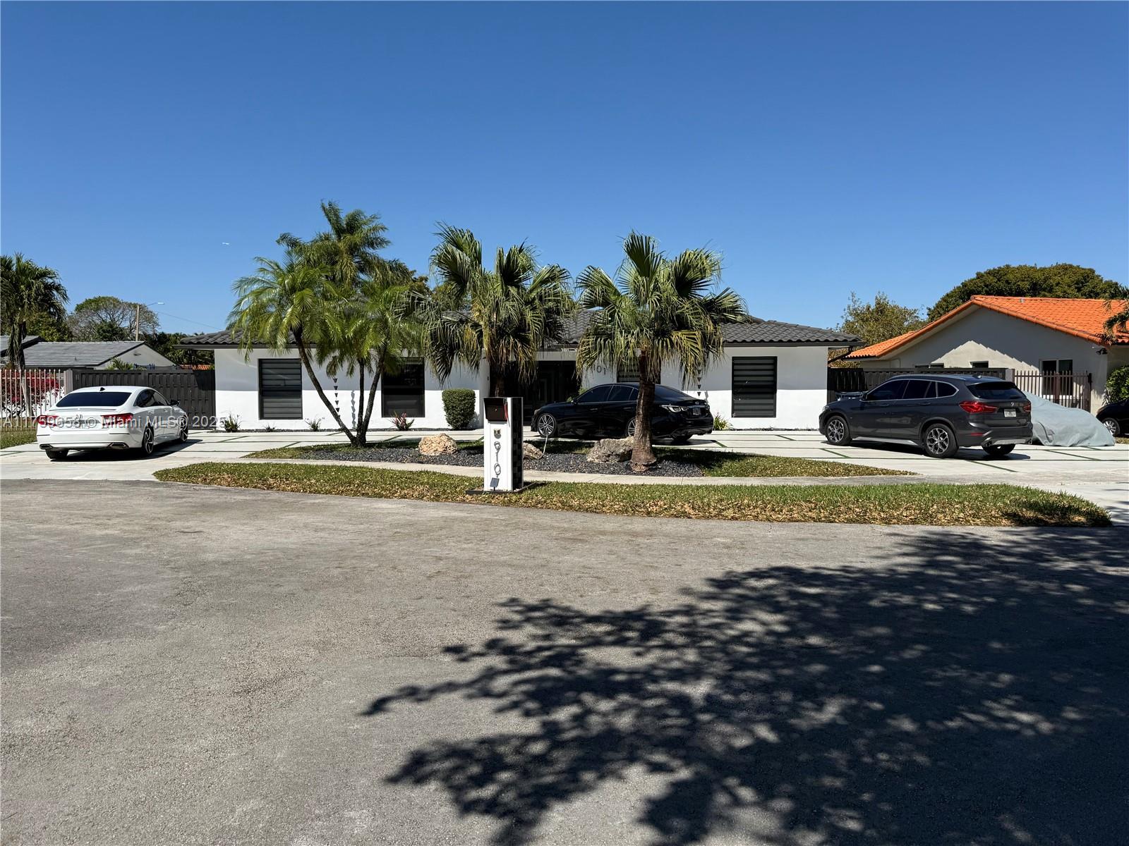 9101 Southwest 11th Street Miami, FL 33174 - Photo 2 of 25 a view of car parked on the side of the road