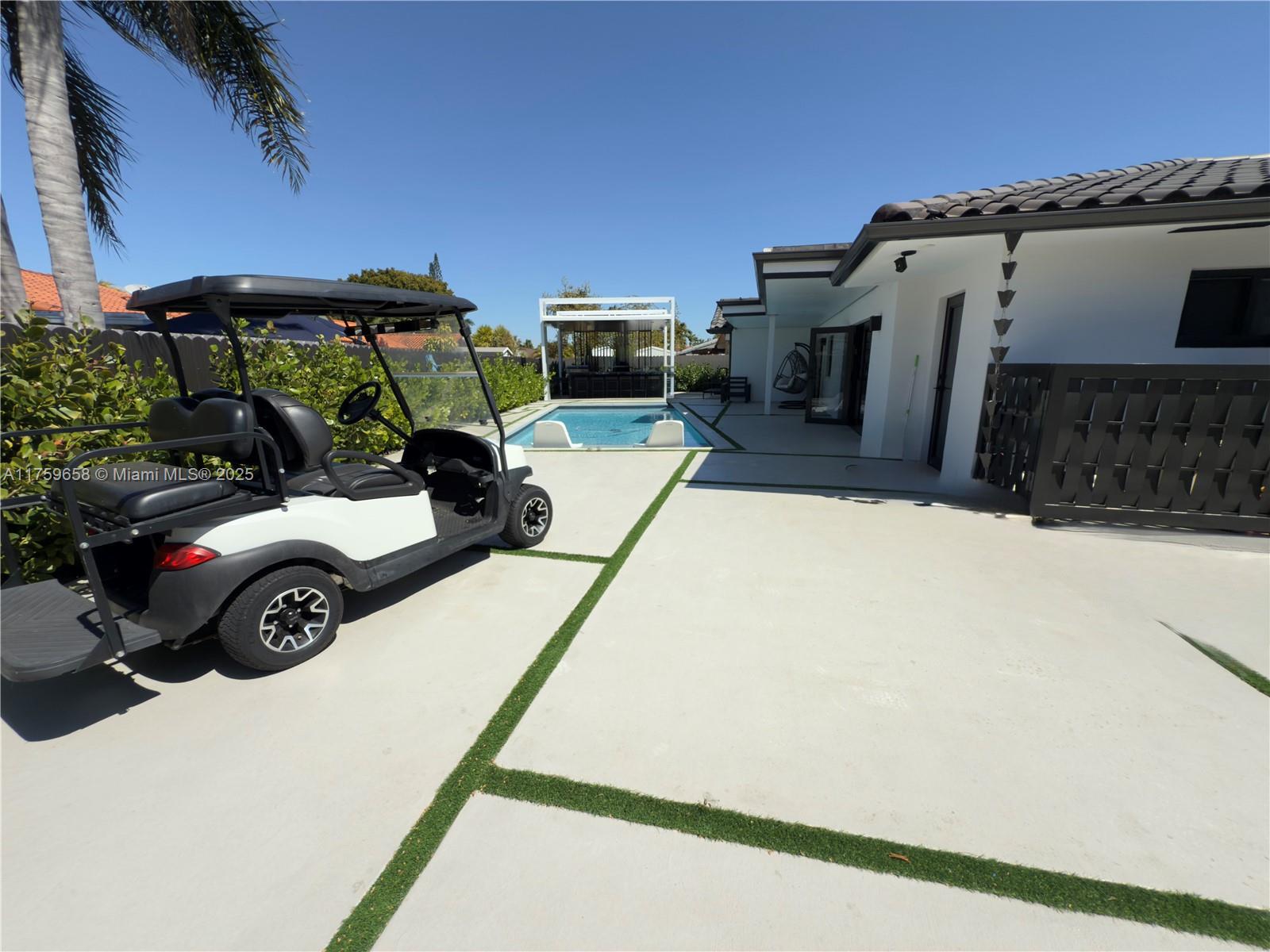 9101 Southwest 11th Street Miami, FL 33174 - Photo 23 of 25 a view of a house with a patio