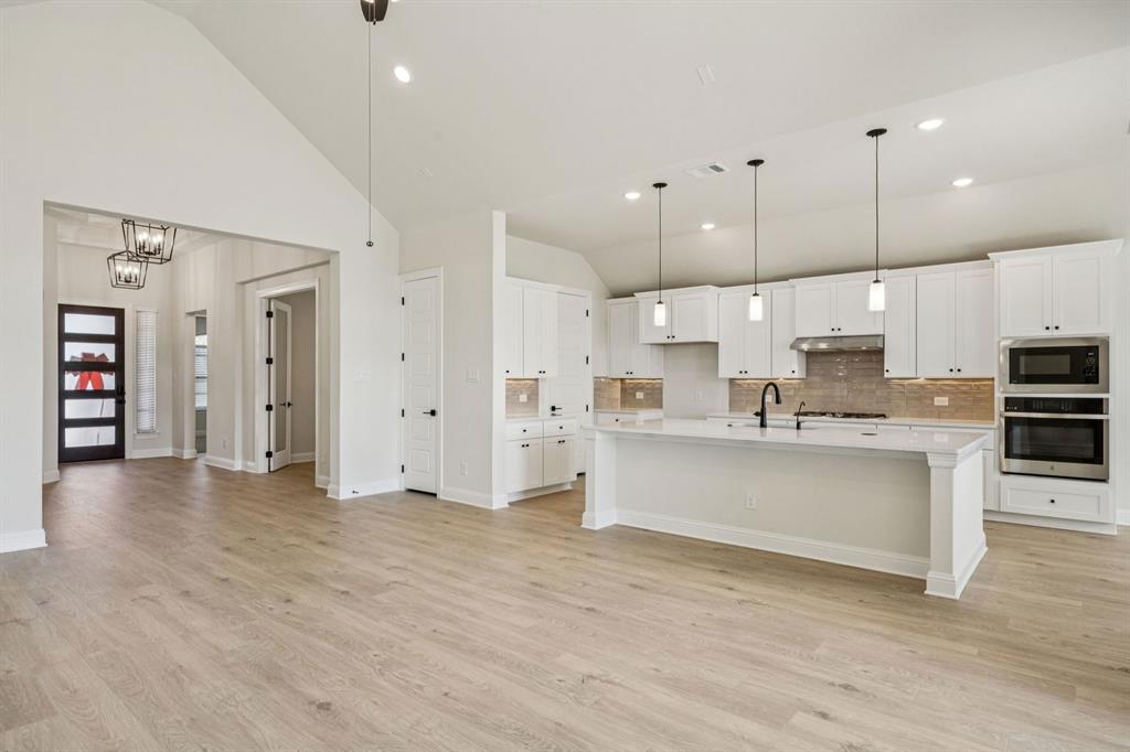 744 Carriage Hl Road Midlothian, TX 76065 - Photo 3 of 23 a view of kitchen with wooden floor