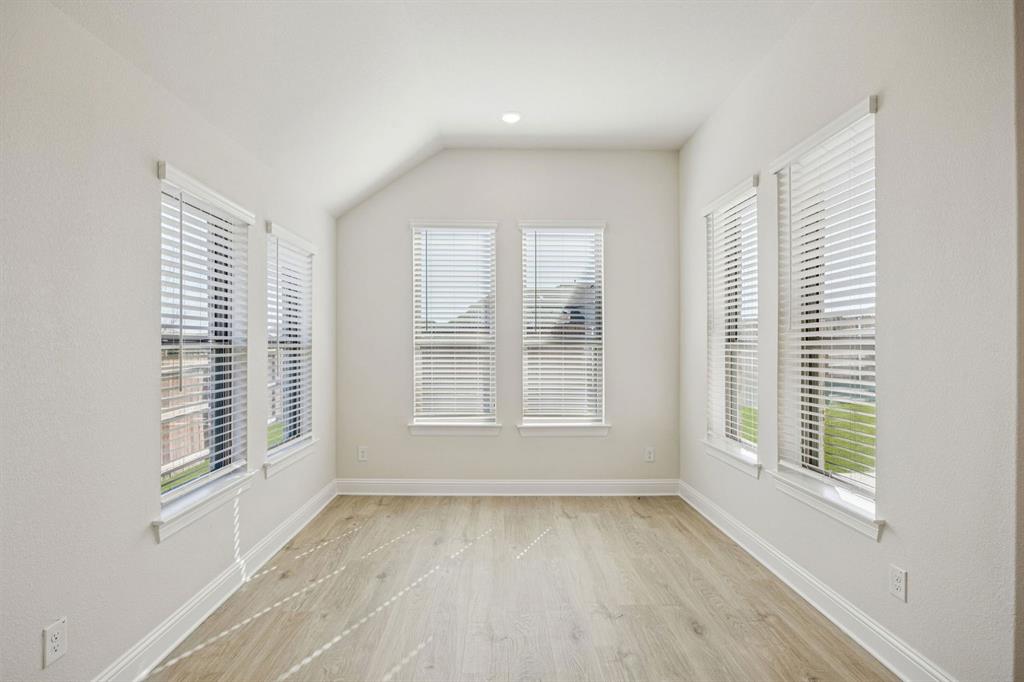 744 Carriage Hl Road Midlothian, TX 76065 - Photo 6 of 23 a view of an empty room with a window