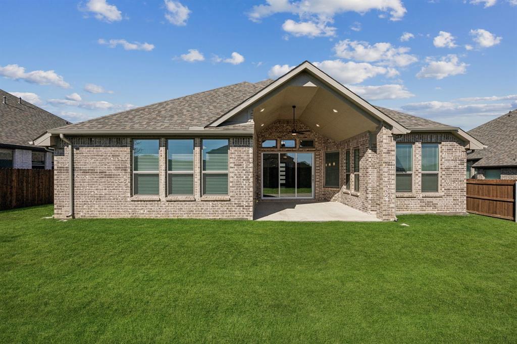 744 Carriage Hl Road Midlothian, TX 76065 - Photo 10 of 23 a view of a house with a yard and porch