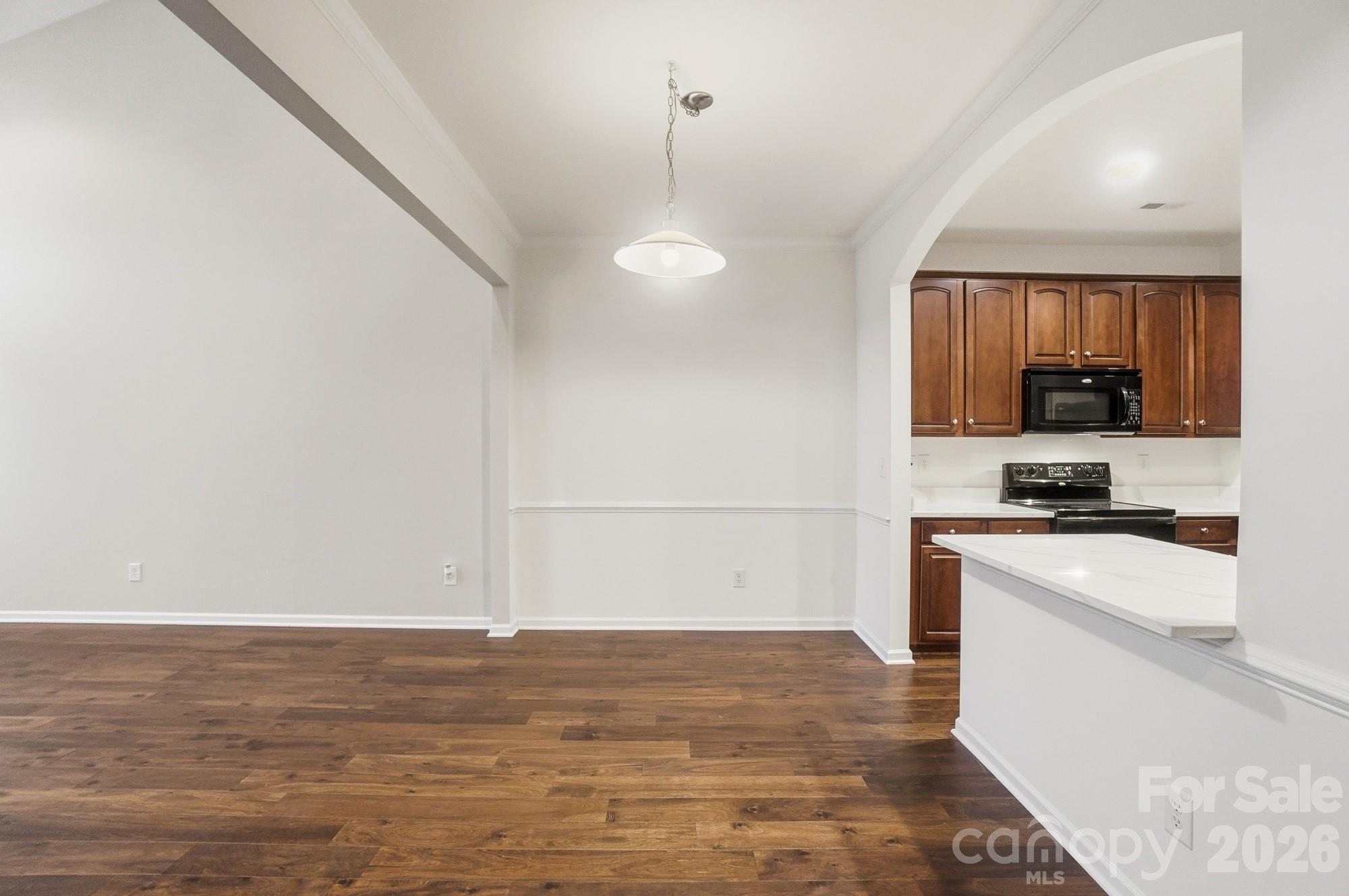 284 Garnet Court Fort Mill, SC 29708 - Photo 11 of 42 a view of a kitchen with stove and microwave