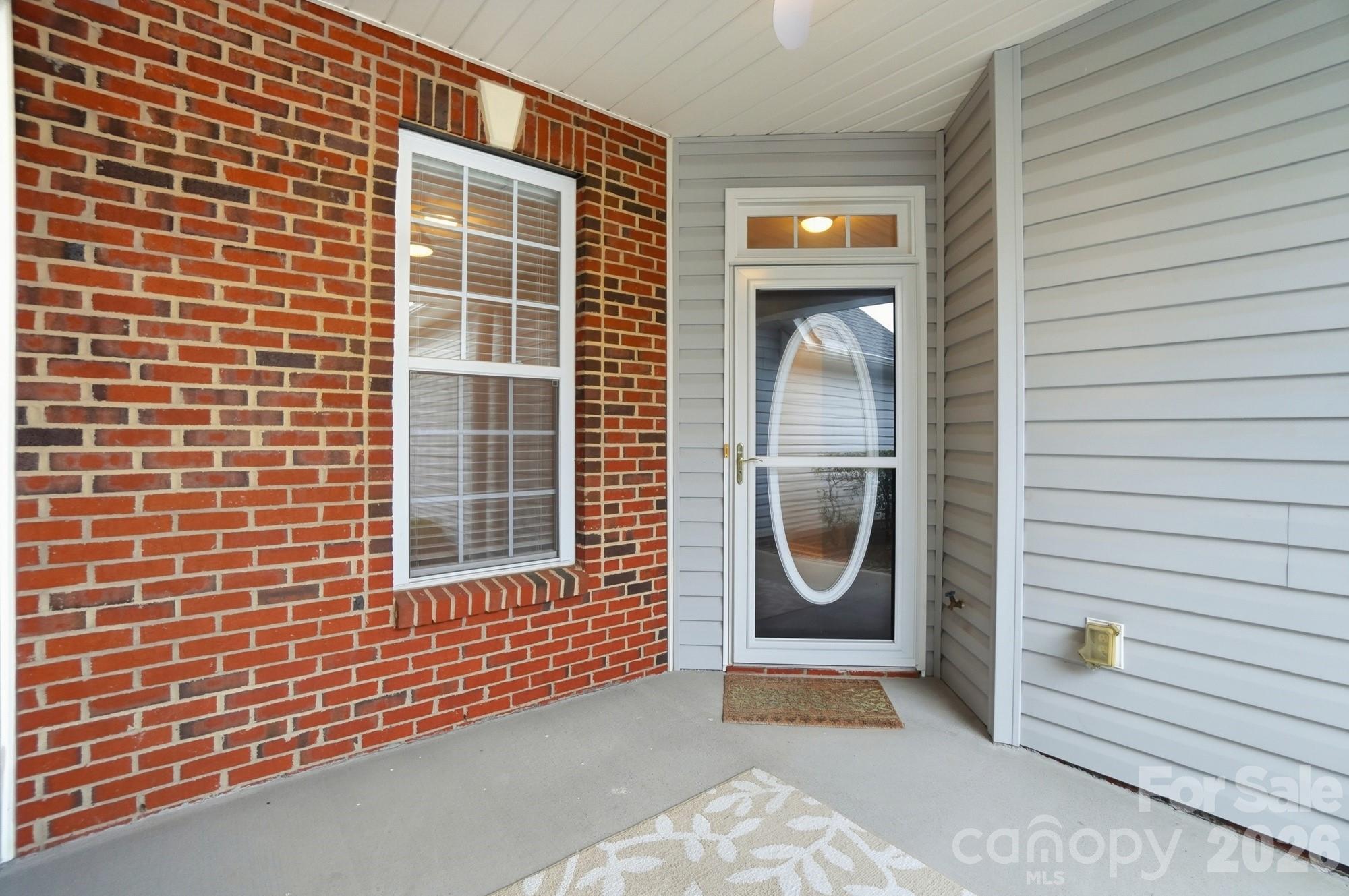284 Garnet Court Fort Mill, SC 29708 - Photo 2 of 42 a front view of a house with glass door
