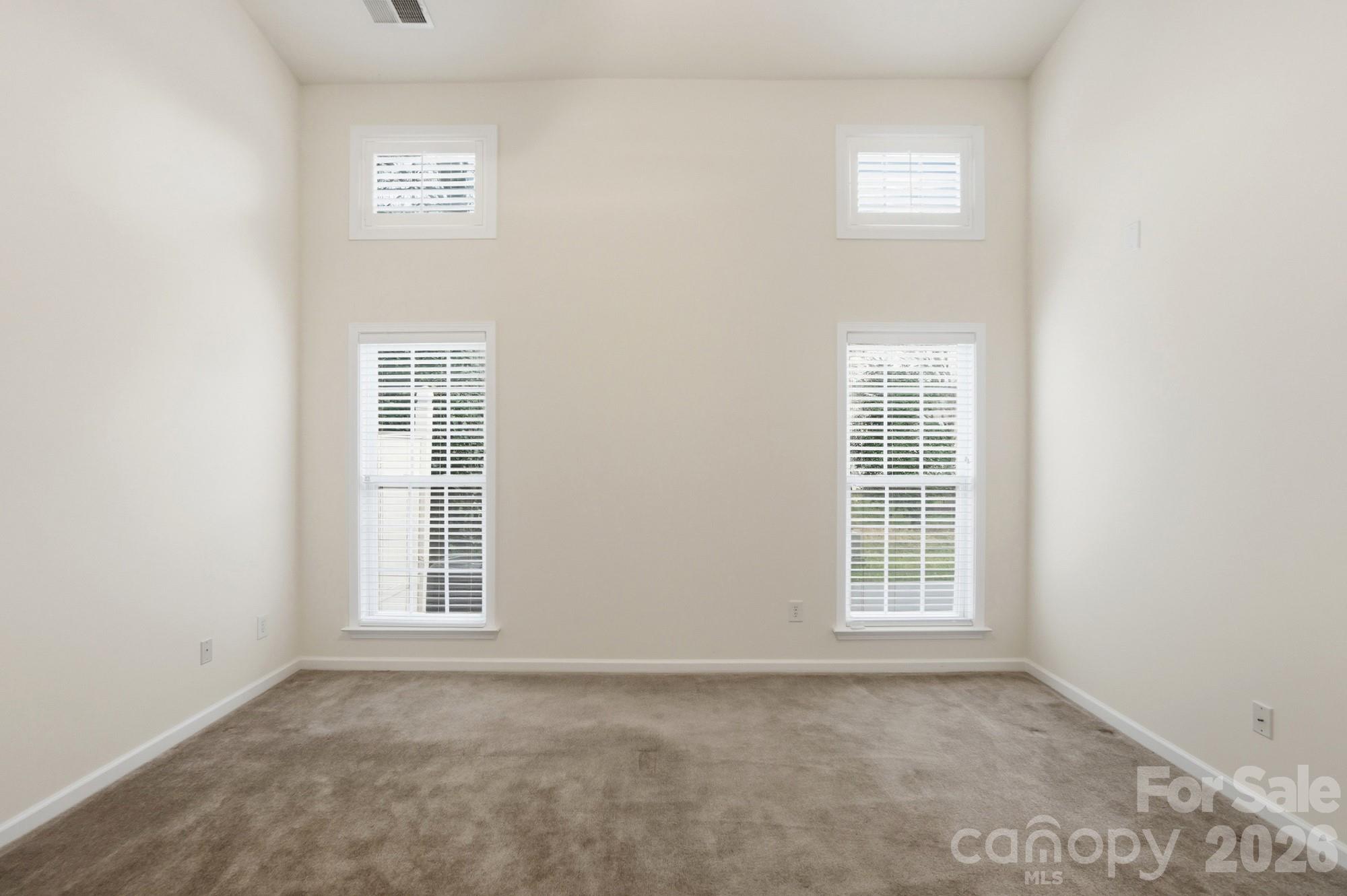 284 Garnet Court Fort Mill, SC 29708 - Photo 21 of 42 an empty room with windows