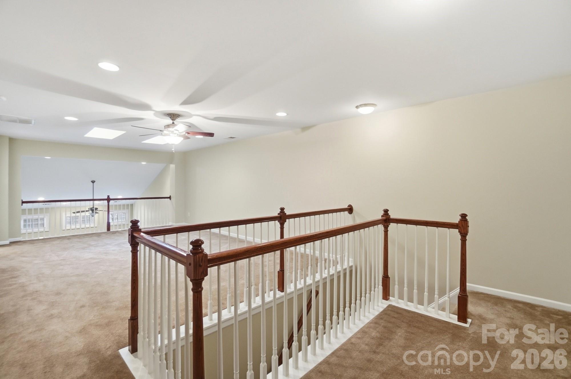 284 Garnet Court Fort Mill, SC 29708 - Photo 28 of 42 a view of a hallway with workspace