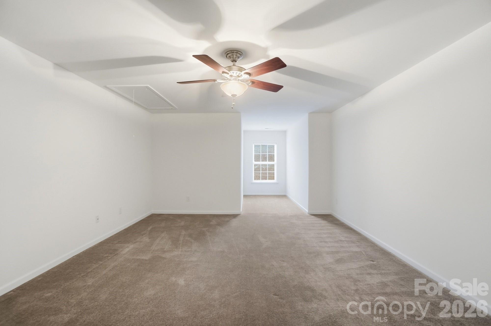 284 Garnet Court Fort Mill, SC 29708 - Photo 30 of 42 an empty room with windows and fan