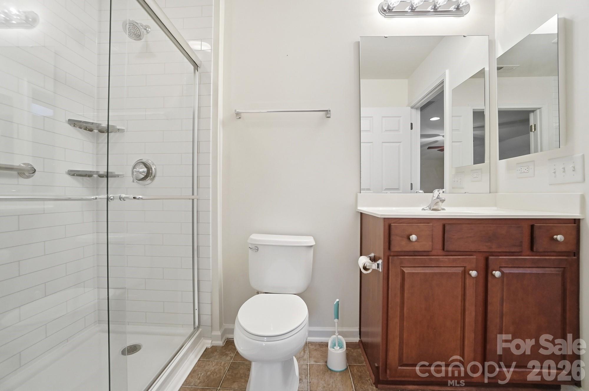284 Garnet Court Fort Mill, SC 29708 - Photo 32 of 42 a bathroom with a sink toilet and shower