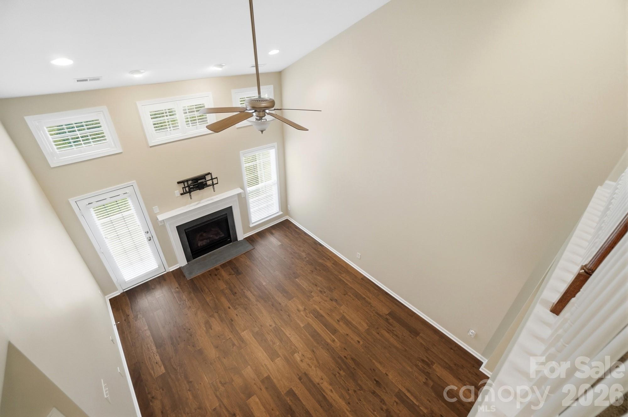 284 Garnet Court Fort Mill, SC 29708 - Photo 35 of 42 a view of a kitchen with wooden floor and a ceiling fan
