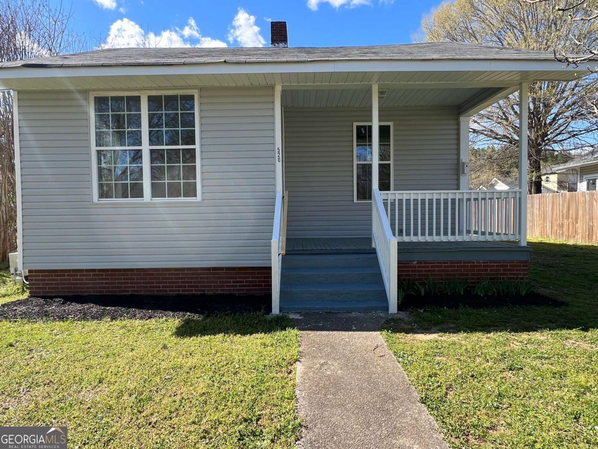 520 Second Street Rome, GA 30161 - Photo 1 of 1 a front view of a house with a yard
