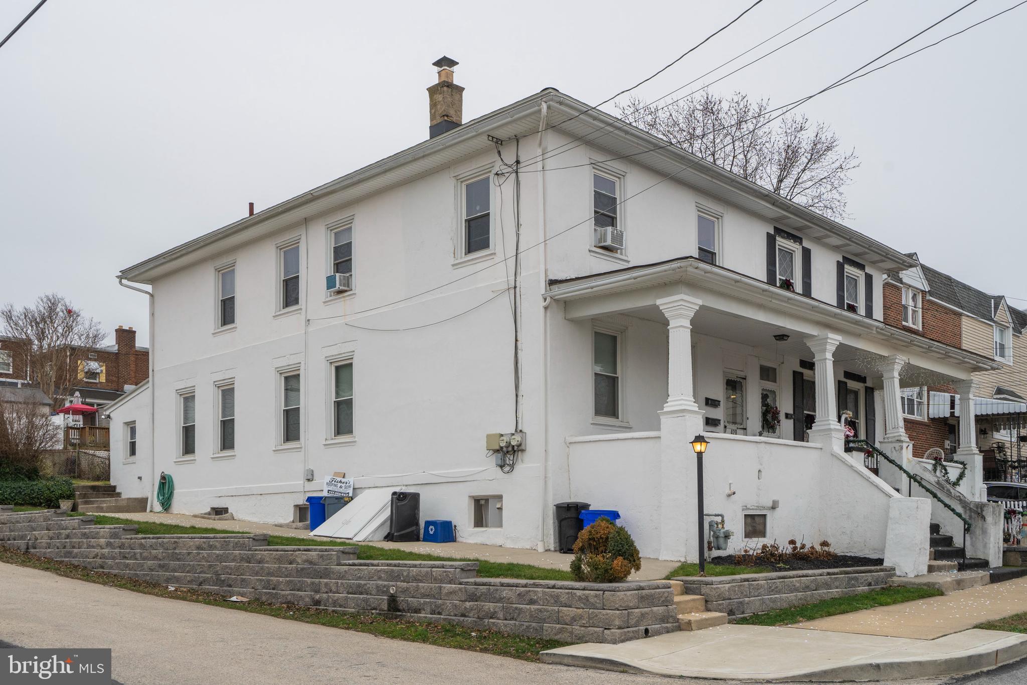 420 Prospect Avenue, Unit 1 Bridgeport, PA 19405 - Photo 24 of 24 a view of a white building among the street