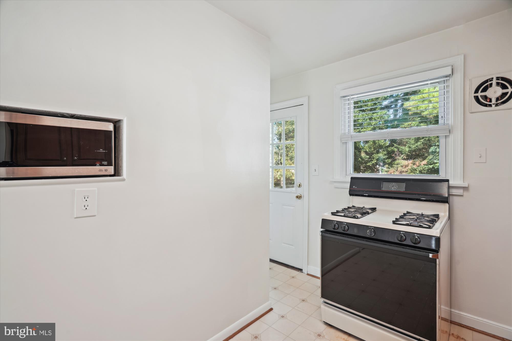 2811 Munson Street Silver Spring, MD 20902 - Photo 12 of 69 Kitchen and Rear Door to Deck