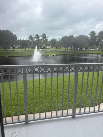 a view of a street with a lake view