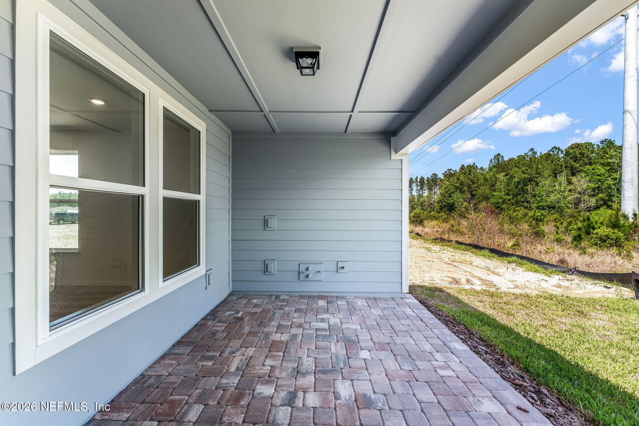 614 Ecliptic Loop Yulee, FL 32097 - Photo 33 of 60 35-web-or-mls-Covered Patio