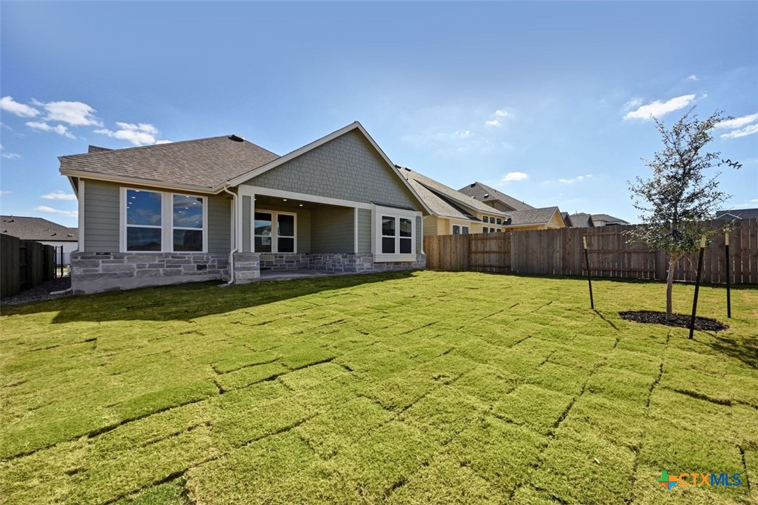 8616 Peristyle Drive Austin, TX 78744 - Photo 20 of 21 Backyard