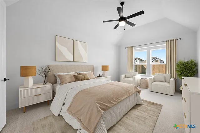 a bedroom with bed and white walls