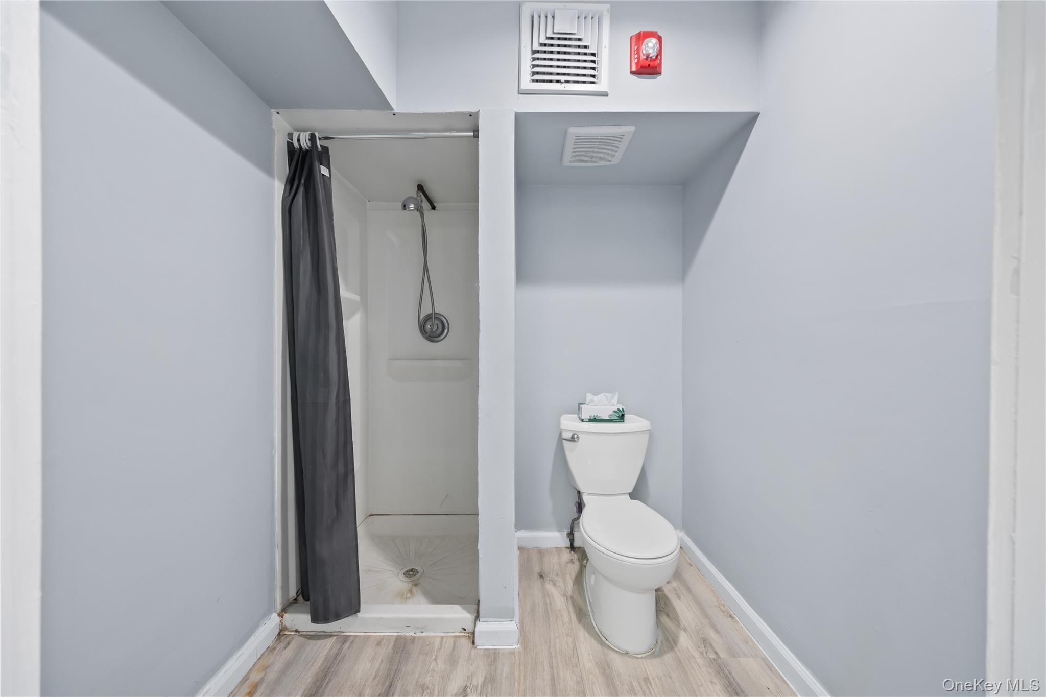 996 Haverstraw Road Suffern, NY 10901 - Photo 26 of 50 a bathroom with a toilet and a shower
