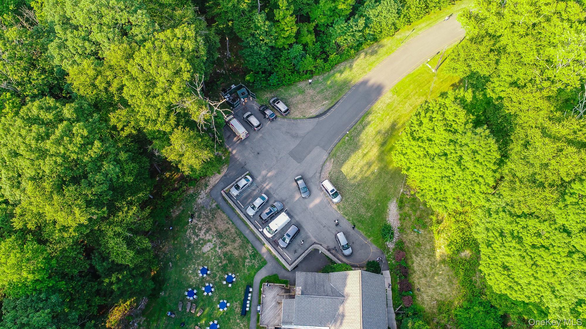 996 Haverstraw Road Suffern, NY 10901 - Photo 44 of 50 an aerial view of a house with a yard and swimming pool