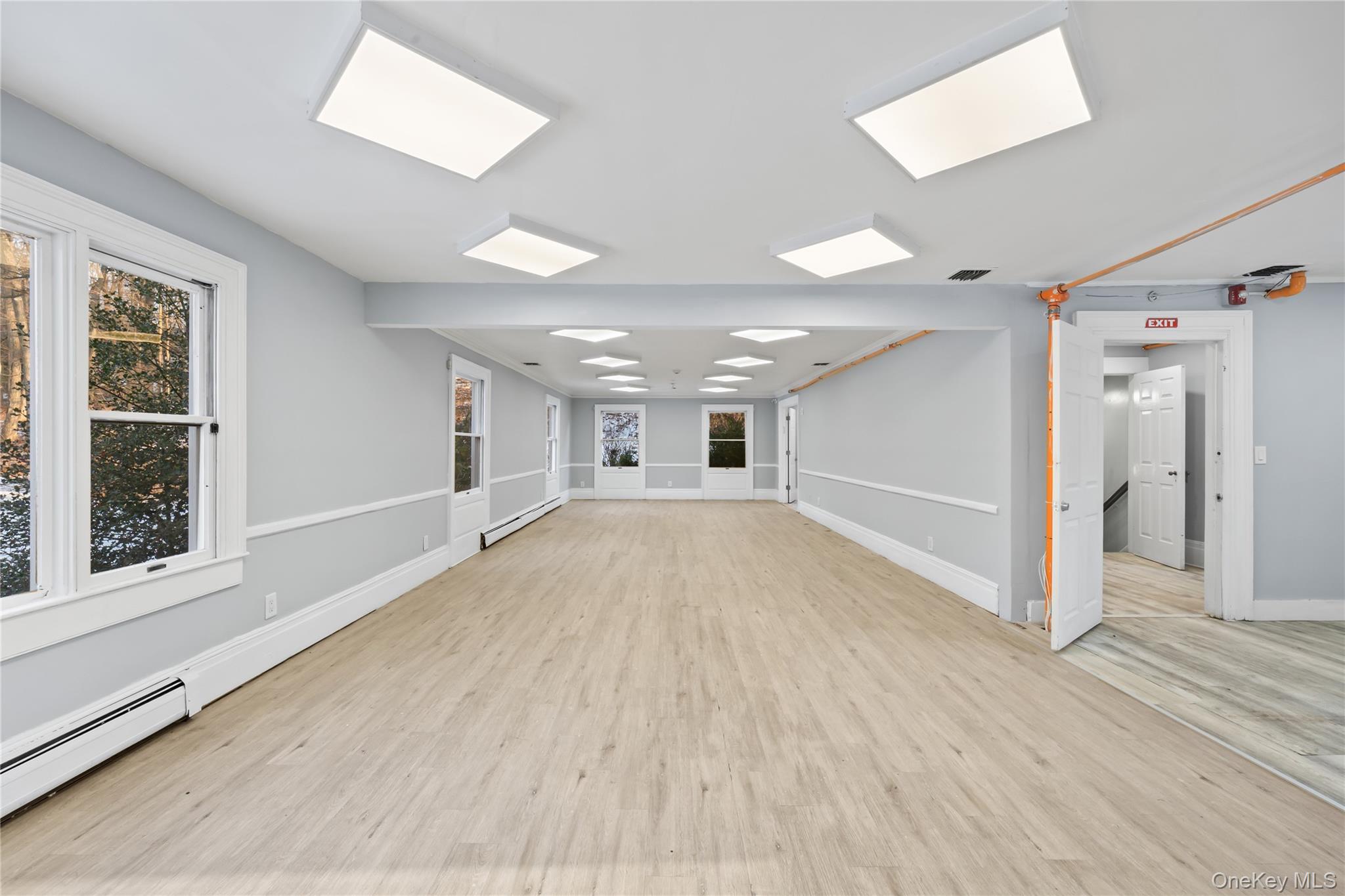 996 Haverstraw Road Suffern, NY 10901 - Photo 6 of 50 wooden floor in an empty room with a window