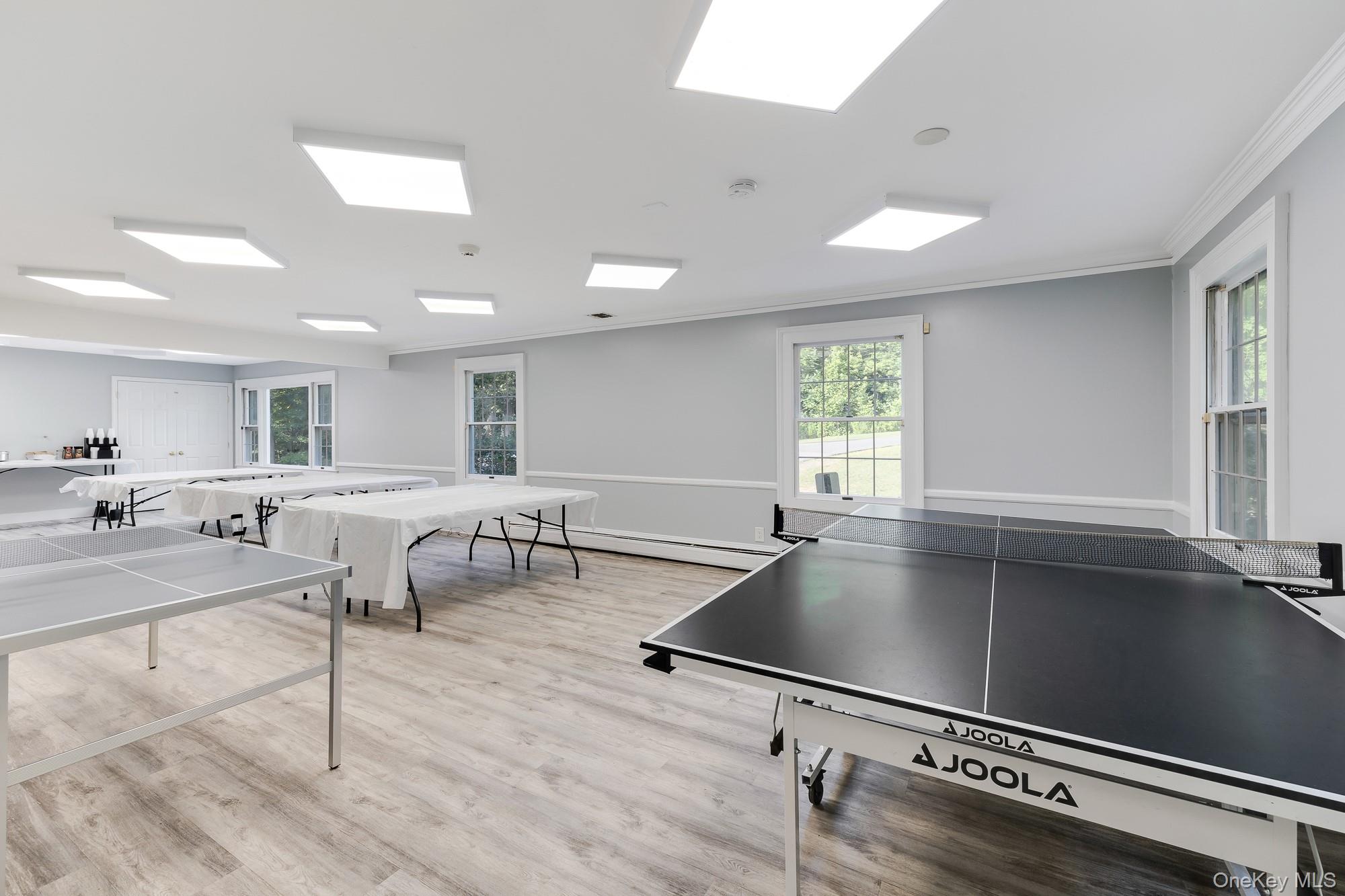996 Haverstraw Road Suffern, NY 10901 - Photo 8 of 50 a kitchen with a table chairs and couches