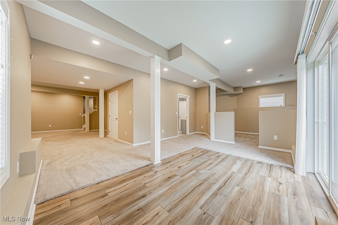 5270 Brainard Road Solon, OH 44139 - Photo 30 of 45 Walk-out basement with light wood-style floors, recessed lighting, and light colored carpet