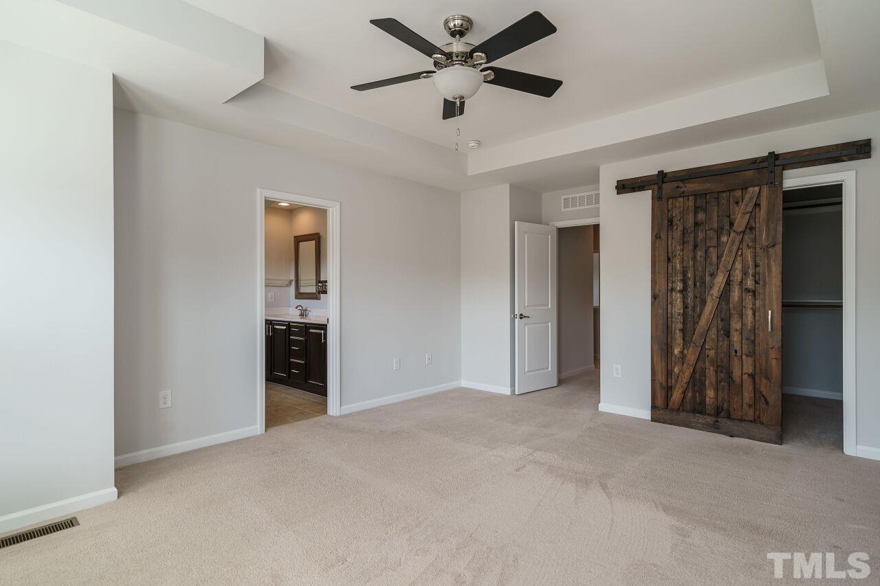 1340 Rodessa Run Raleigh, NC 27607 - Photo 17 of 28 a view of empty room with ceiling fan