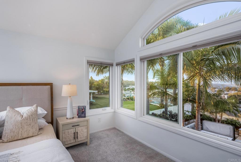 608 Crest Drive Encinitas, CA 92024 - Photo 27 of 33 a bedroom with furniture and large windows