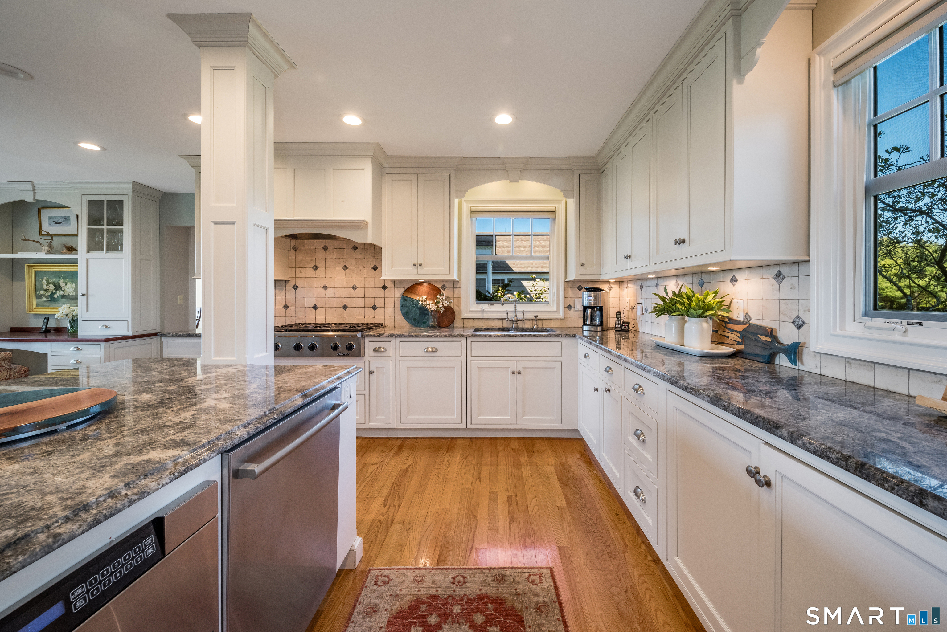 28 Walden Hill Road Guilford, CT 06437 - Photo 11 of 35 a kitchen with stainless steel appliances granite countertop a sink stove and cabinets