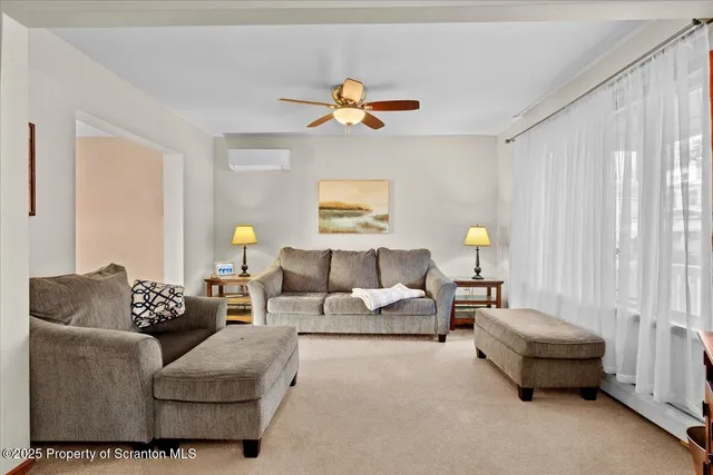 a living room with furniture and a couch