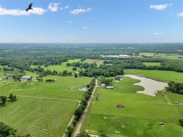 a view of a golf course with a park