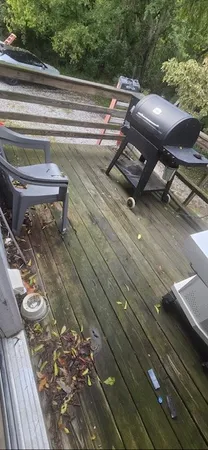 a view of a back yard from a balcony