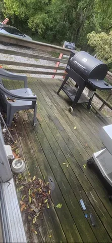 a view of a back yard from a balcony