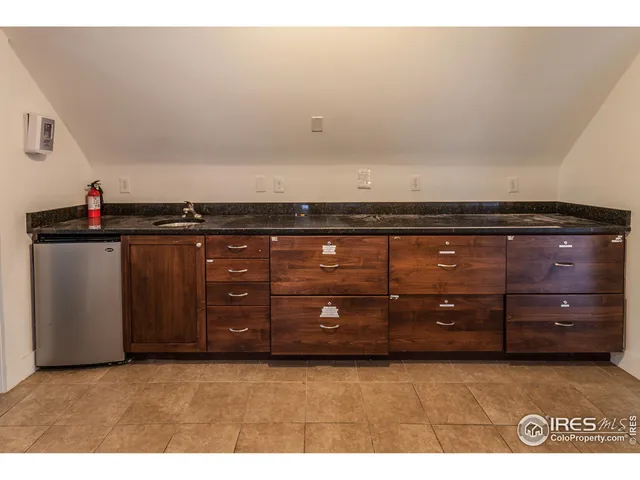 a view of a livingroom with furniture