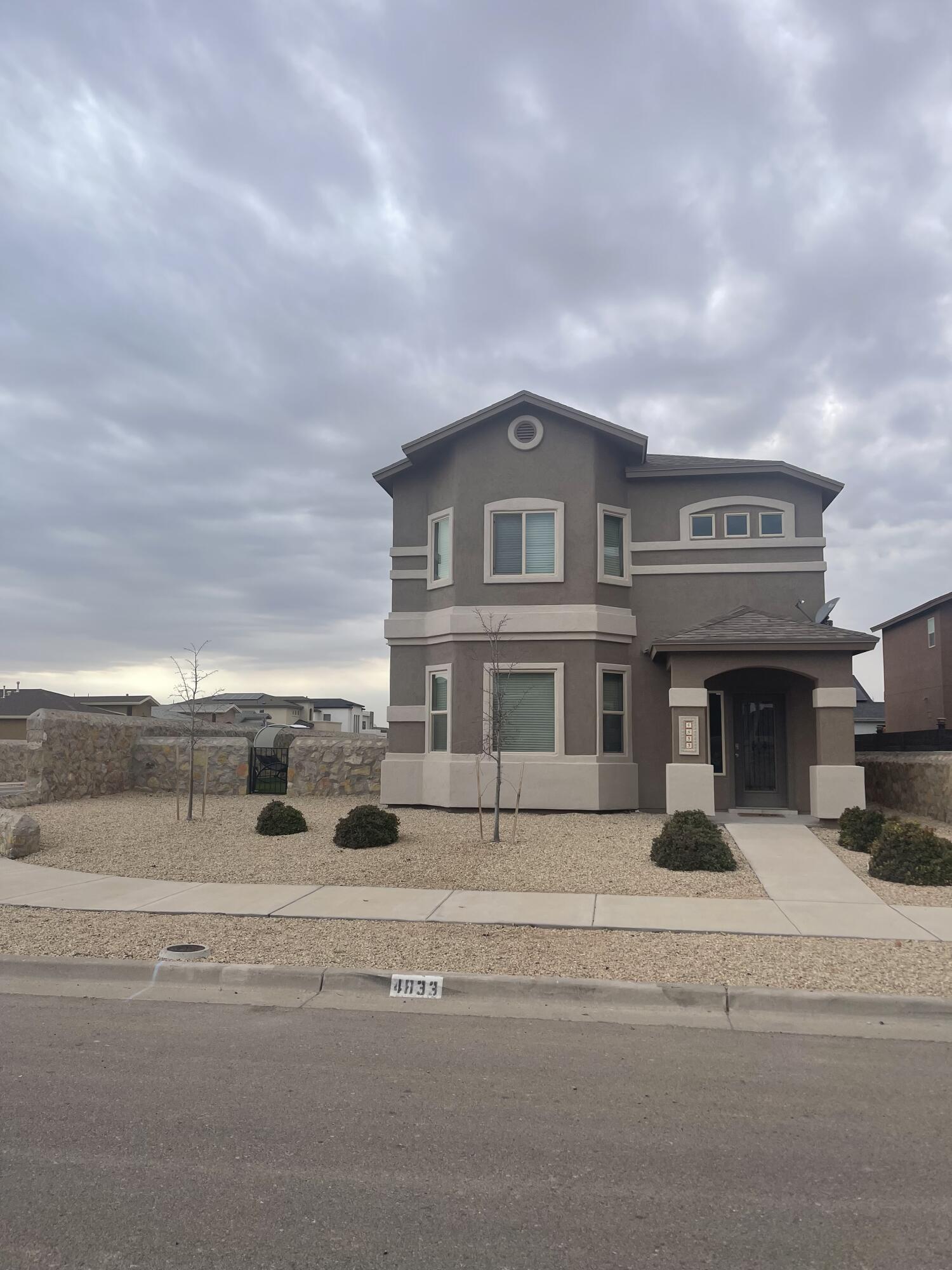 4833 Mark Avizo El Paso, TX 79938 - Photo 1 of 1 a view of building with car parked