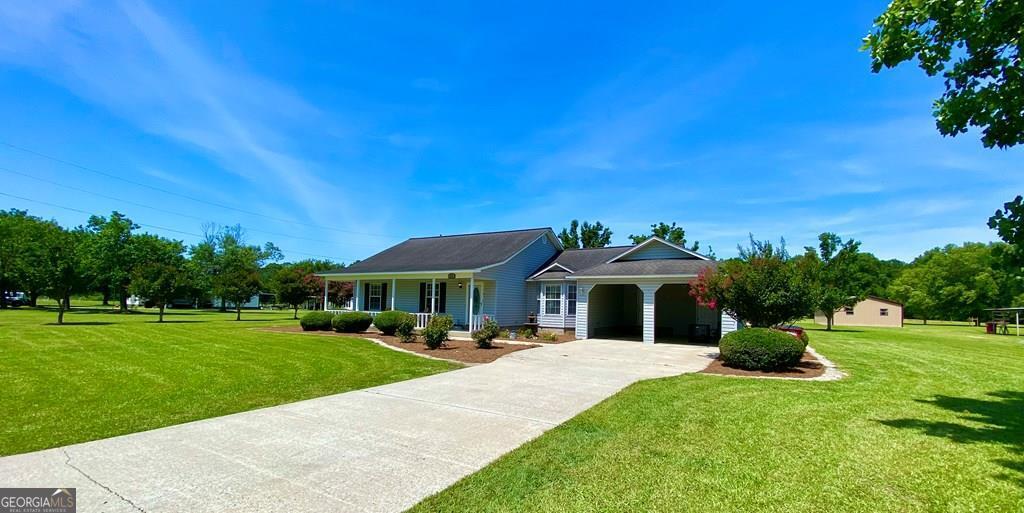 a front view of a house with a yard