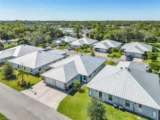 an aerial view of a city with lots of residential buildings