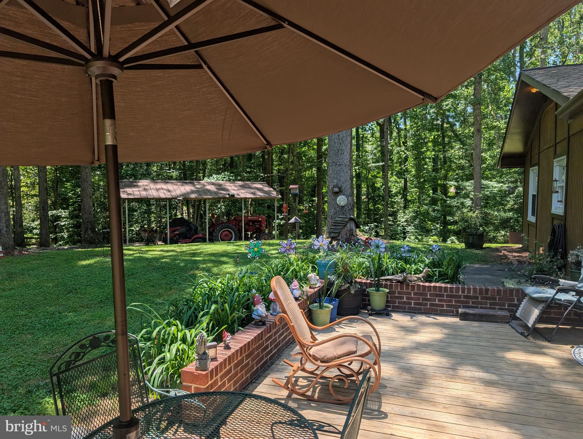 6997 Gilbeth Road Manassas, VA 20112 - Photo 45 of 50 Wood Deck w/ Covered Enclosure in Background