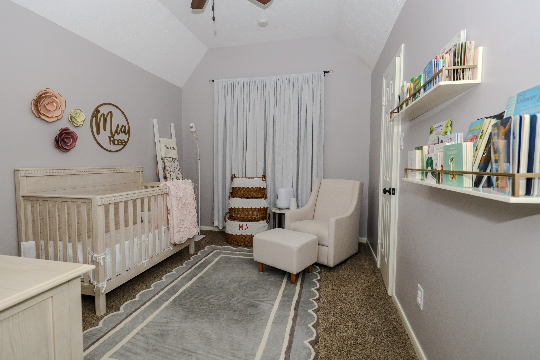 19 Feather Fall Place The Woodlands, TX 77381 - Photo 15 of 20 a bedroom with furniture and a book shelf